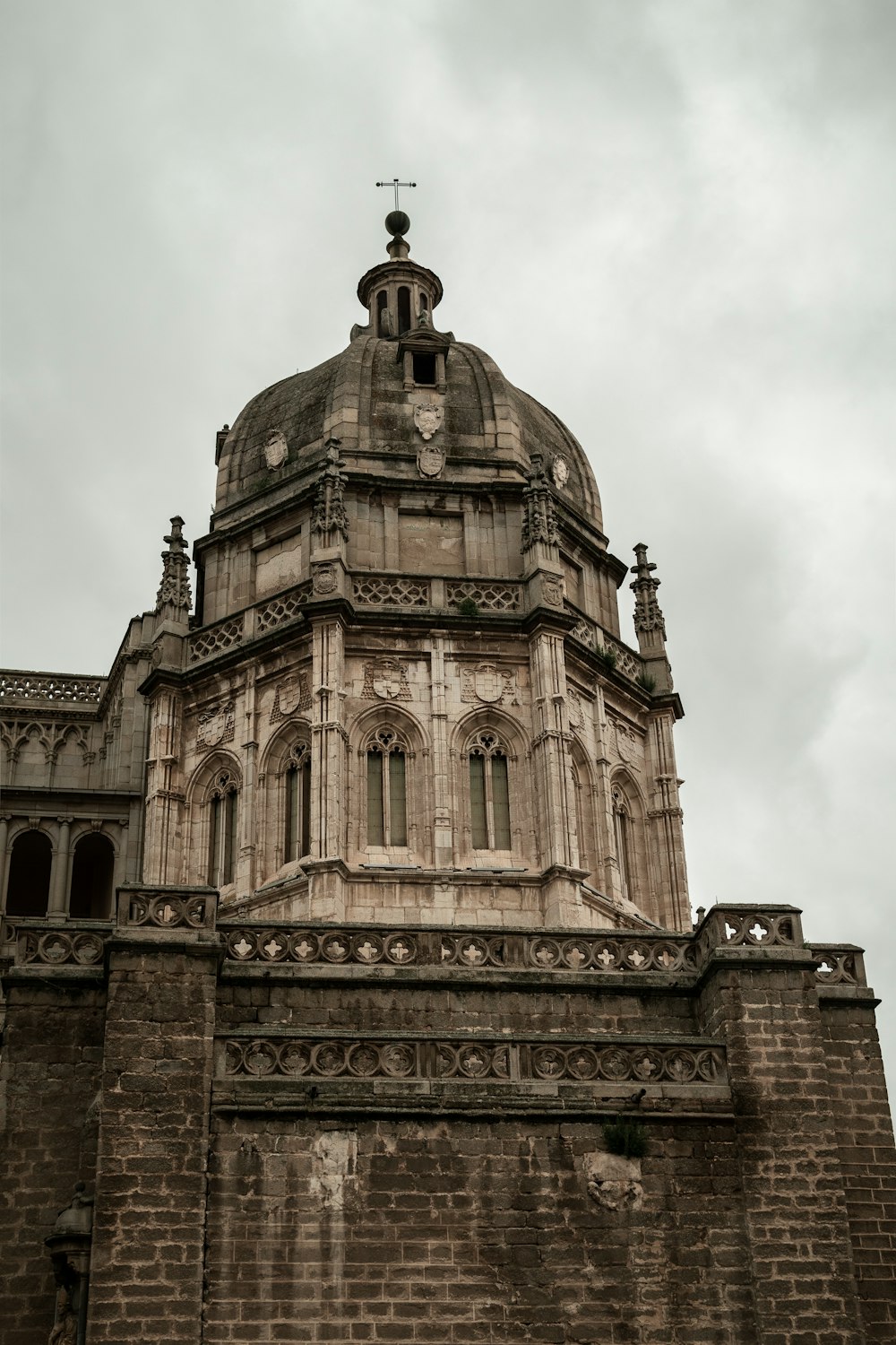 a very tall building with a clock on it's side