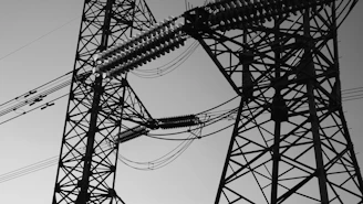 a black and white photo of power lines