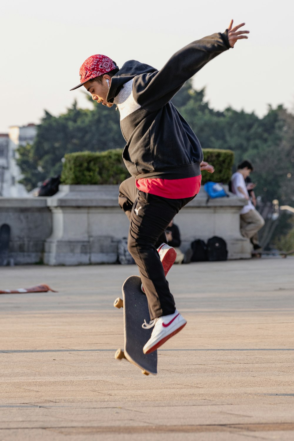 a skateboarder is doing a trick in the air