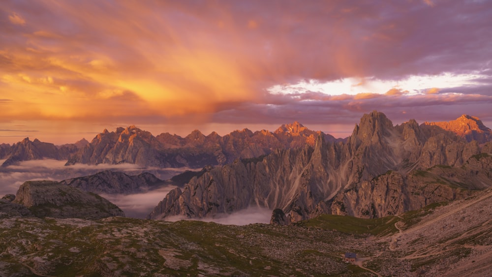 a view of a mountain range at sunset