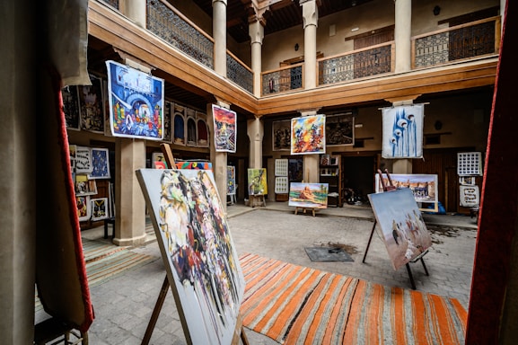 A vibrant art gallery displaying a variety of artworks.