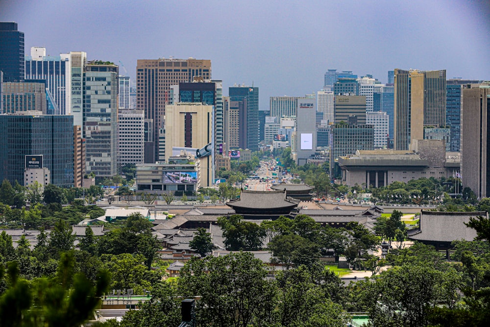 a view of a city with tall buildings