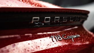 Close-up of a gleaming Porsche Cayenne after ceramic coating application.