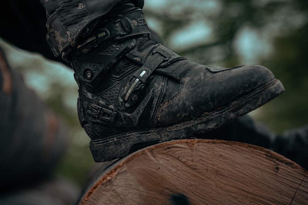 a close up of a person riding a horse