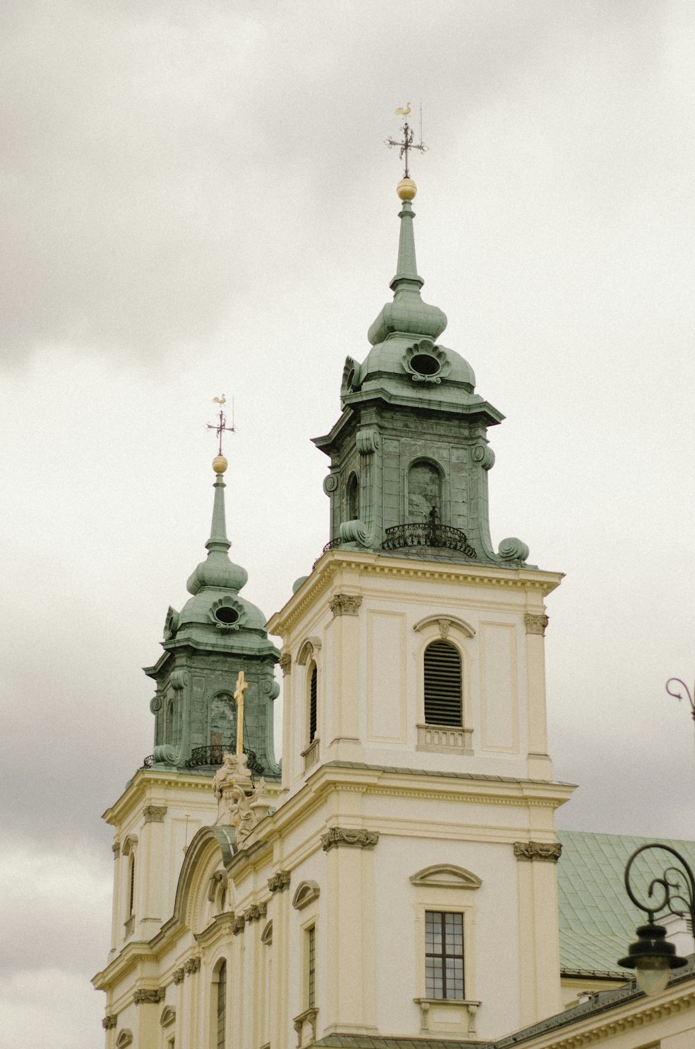 a large white building with a clock on it's side