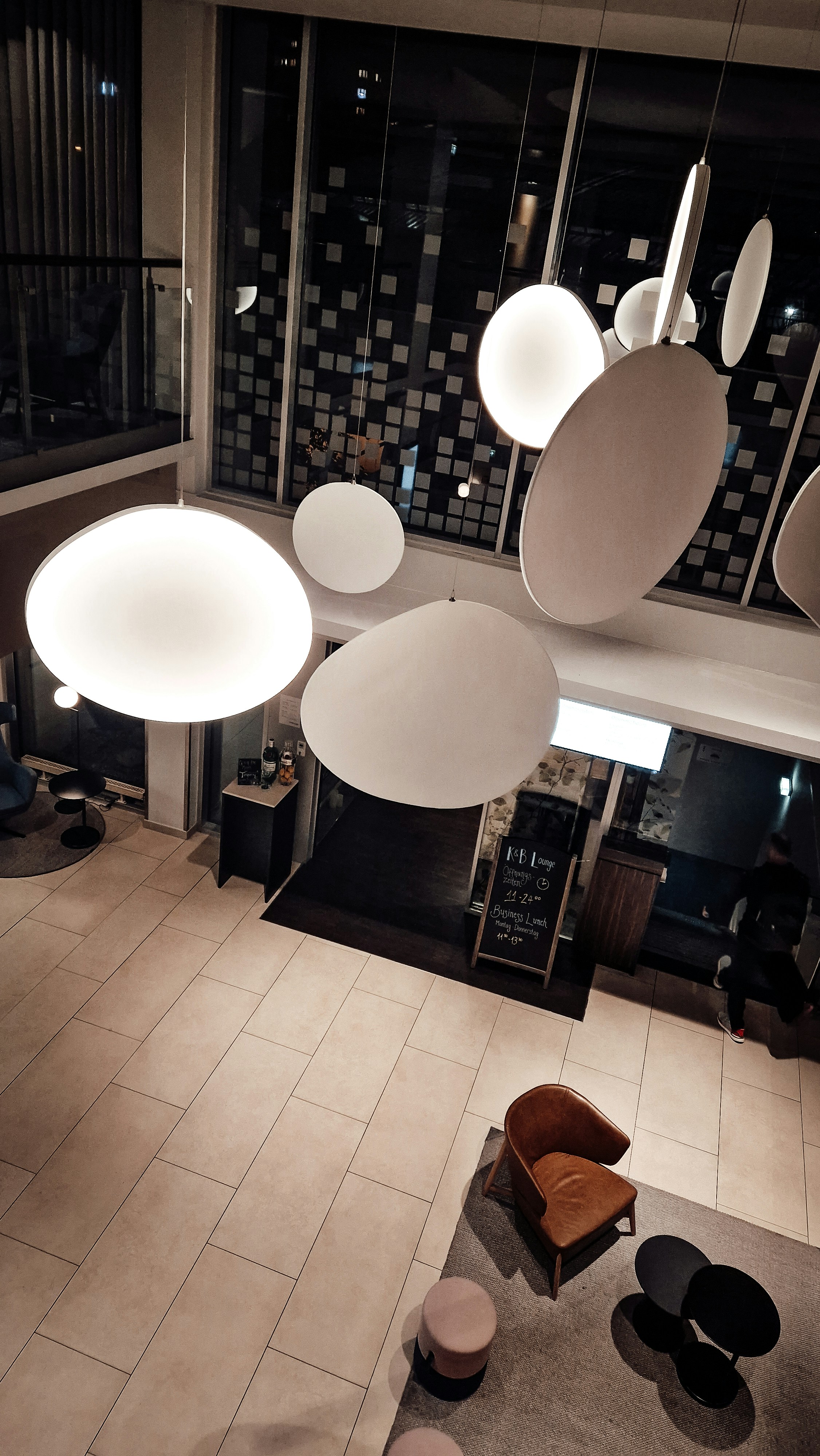 Luxury hotel lobby with modern interior design and ambient lighting