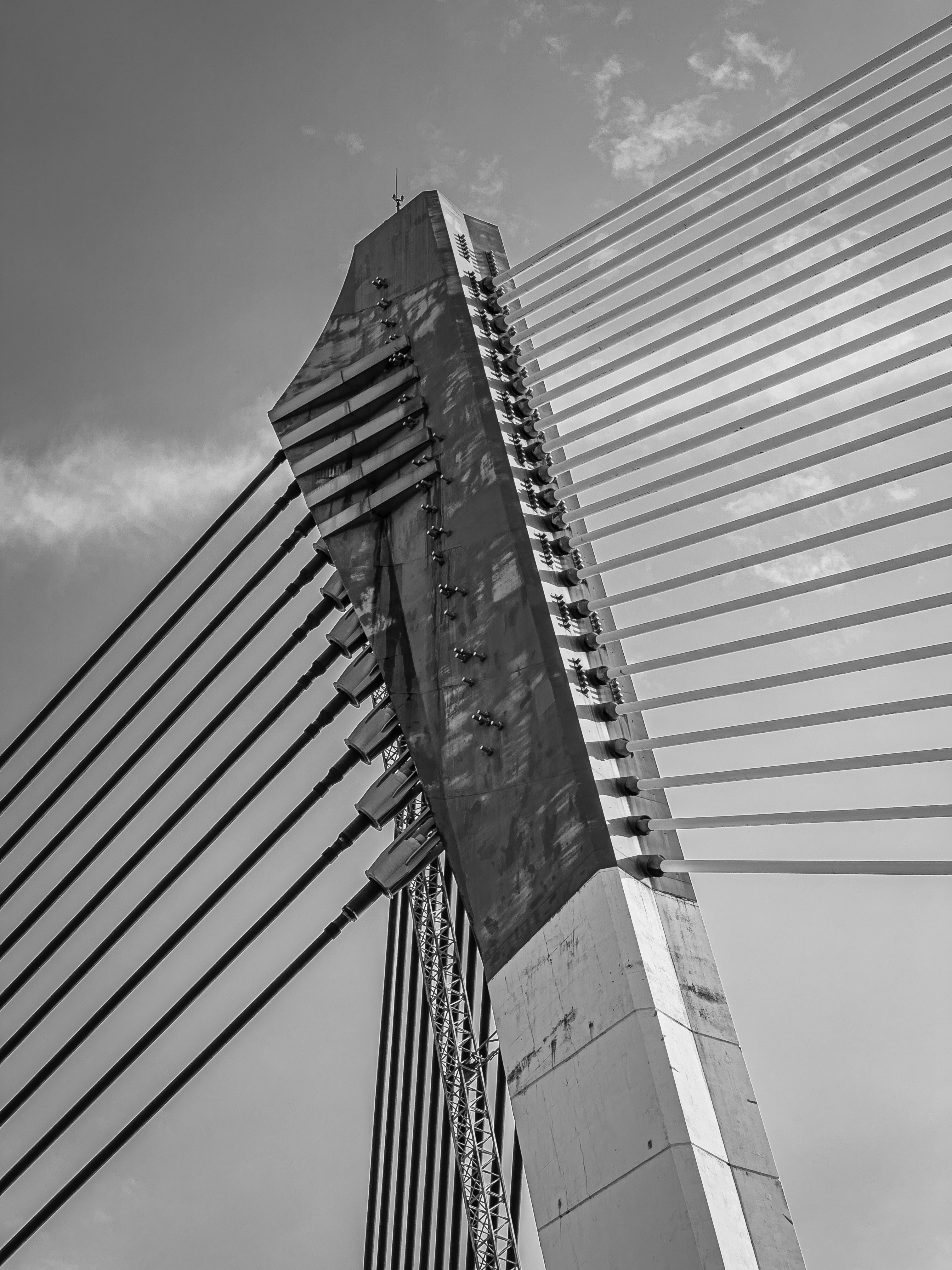 a very tall building with a lot of wires on top of it