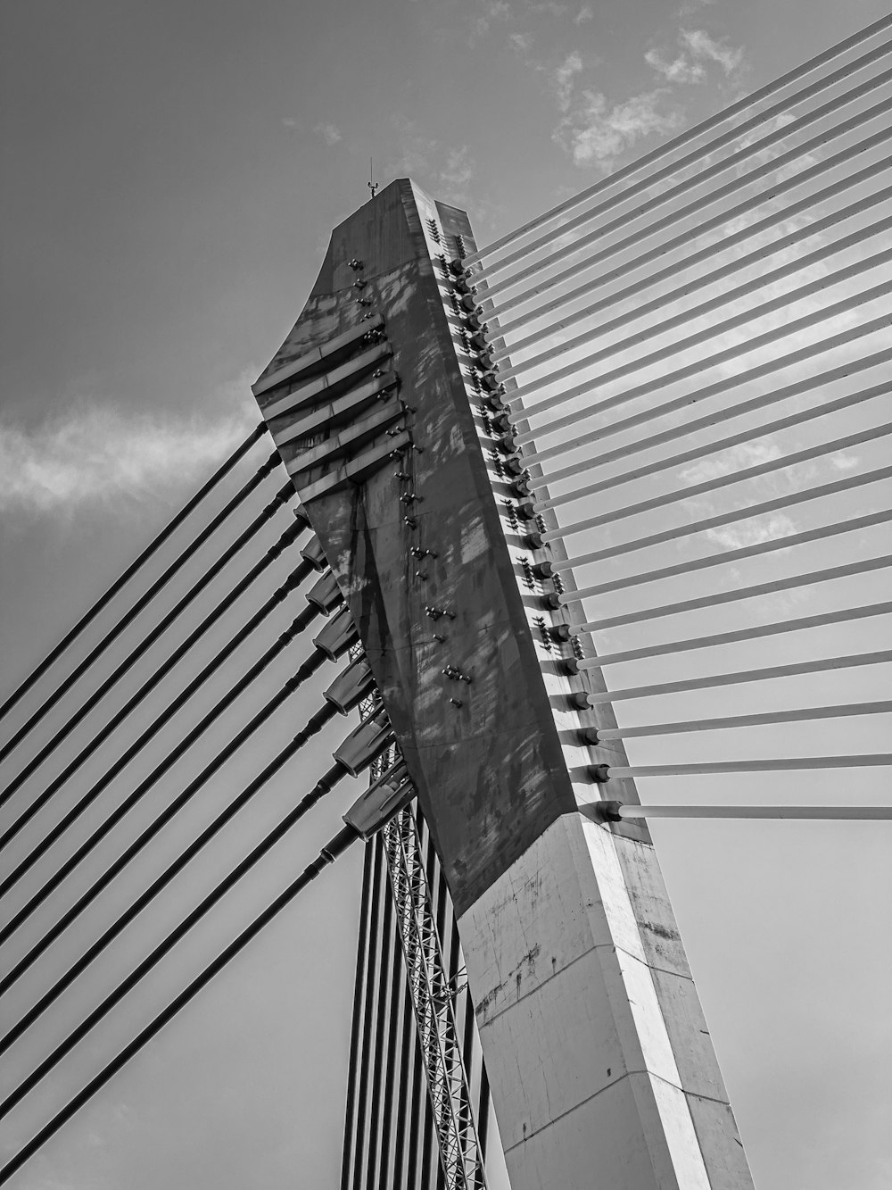 a very tall building with a lot of wires on top of it