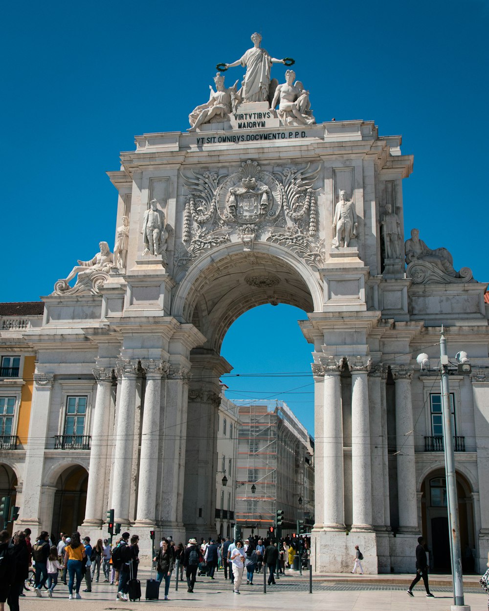 a group of people standing in front of a building