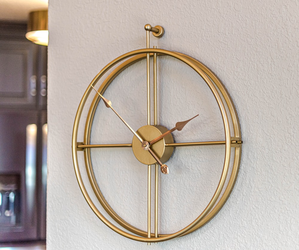 a clock mounted to the side of a wall