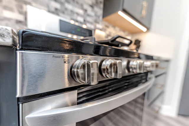 Close-up view of a stove and range in a Somerville kitchen