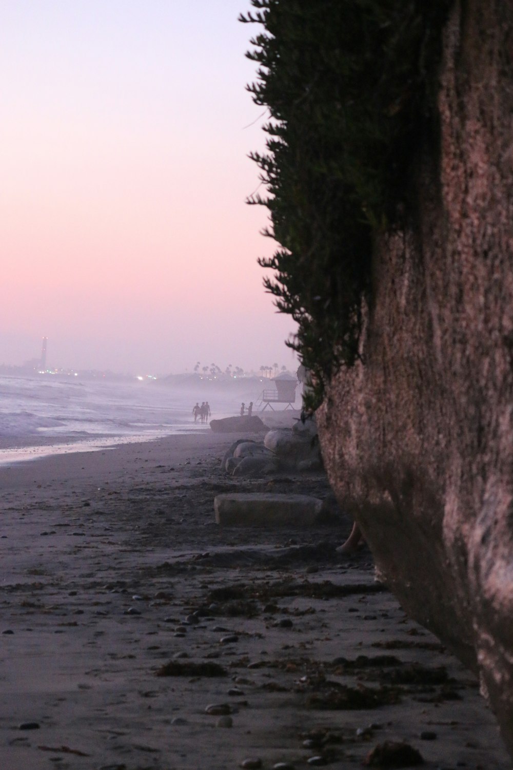 a view of a beach from a cliff