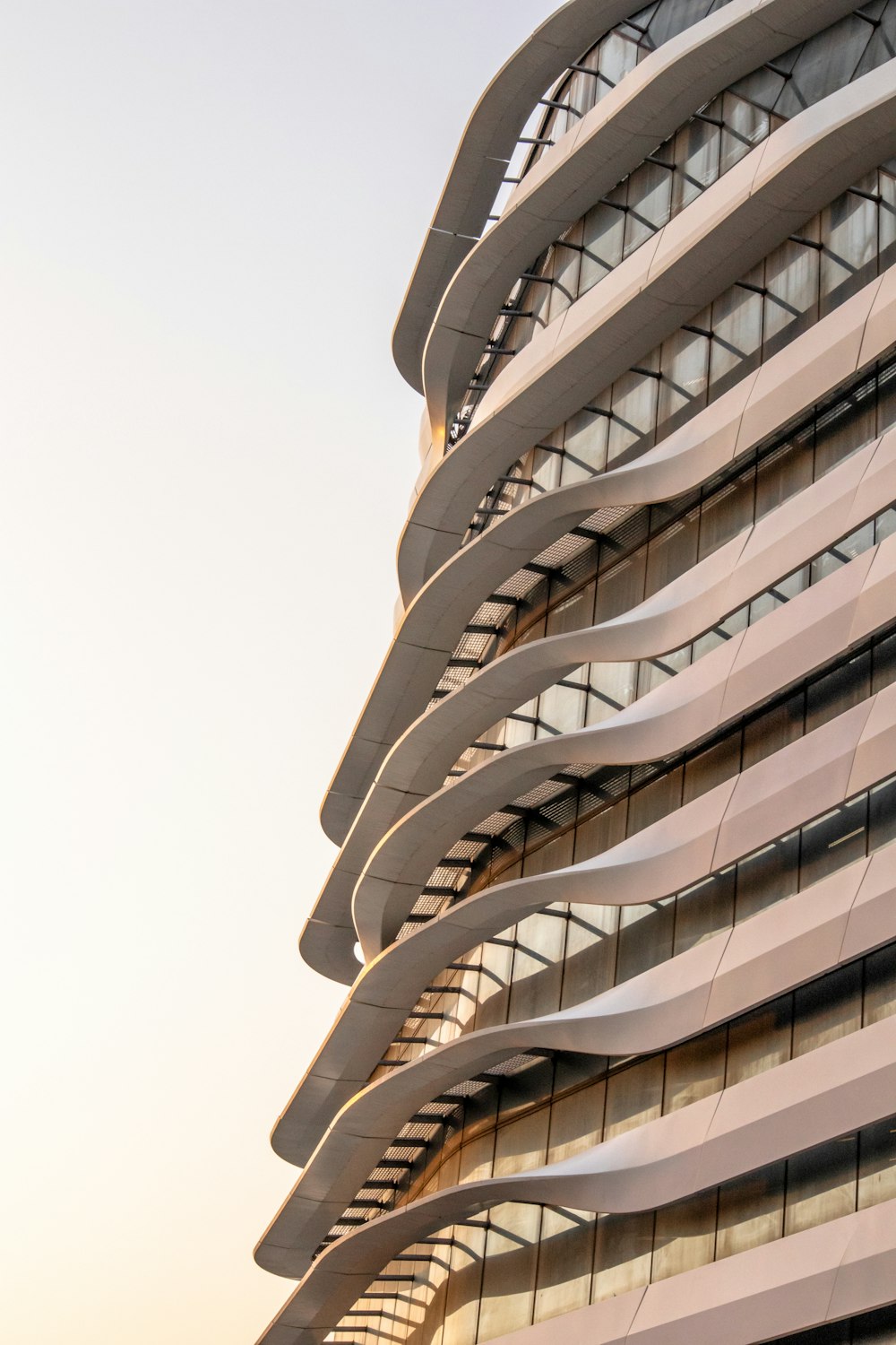 a tall building with many windows on top of it