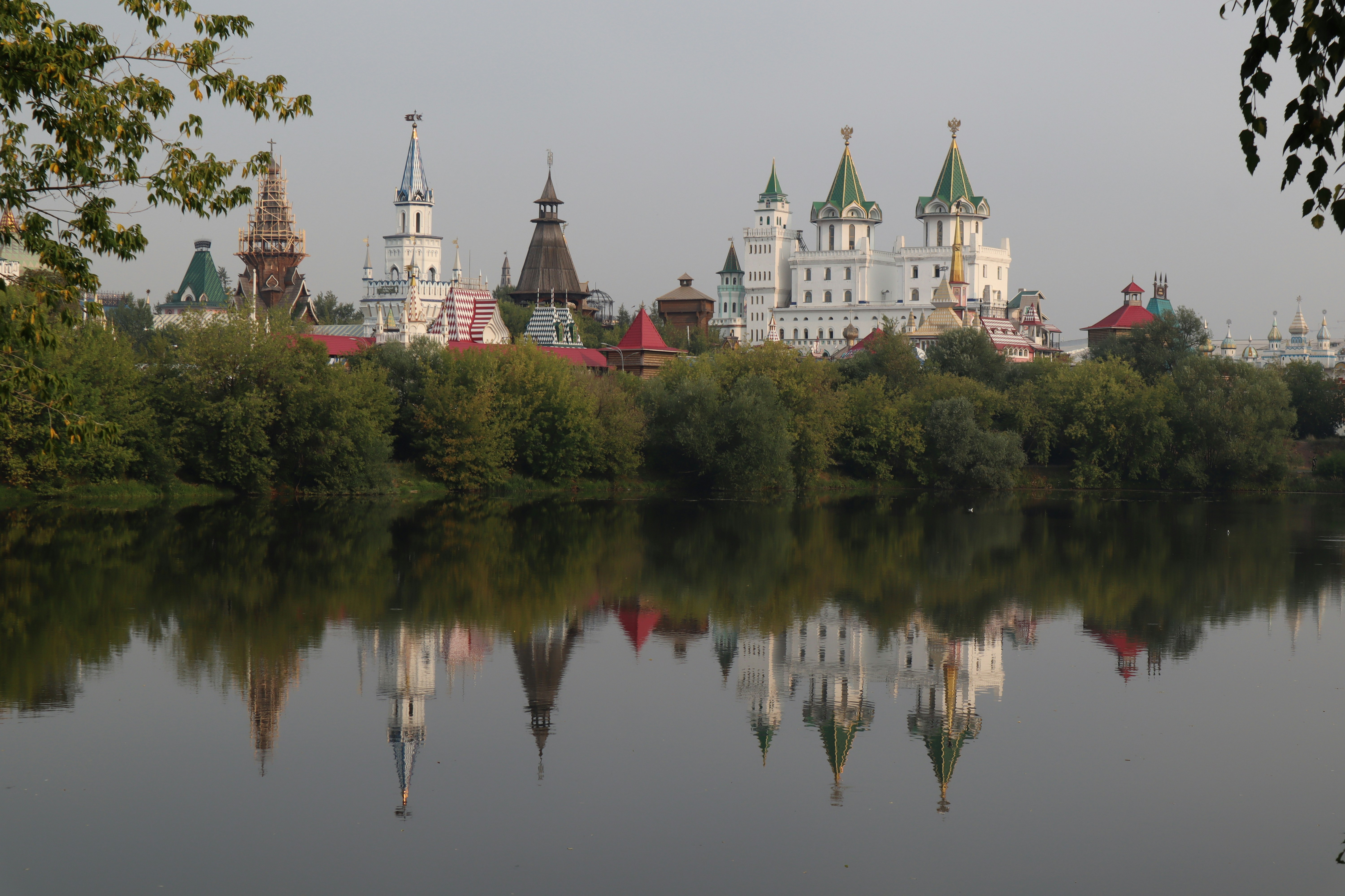 a large body of water with a bunch of buildings in the background