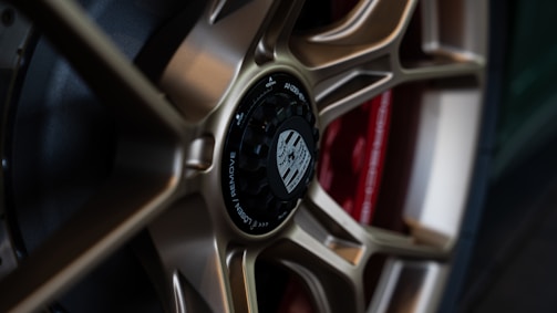 A close-up of stylish wheels with intricate designs and textures.