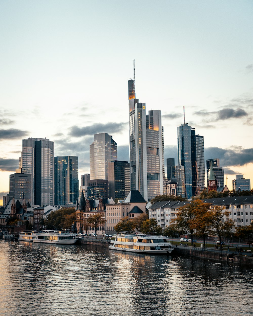 a large body of water with a city in the background