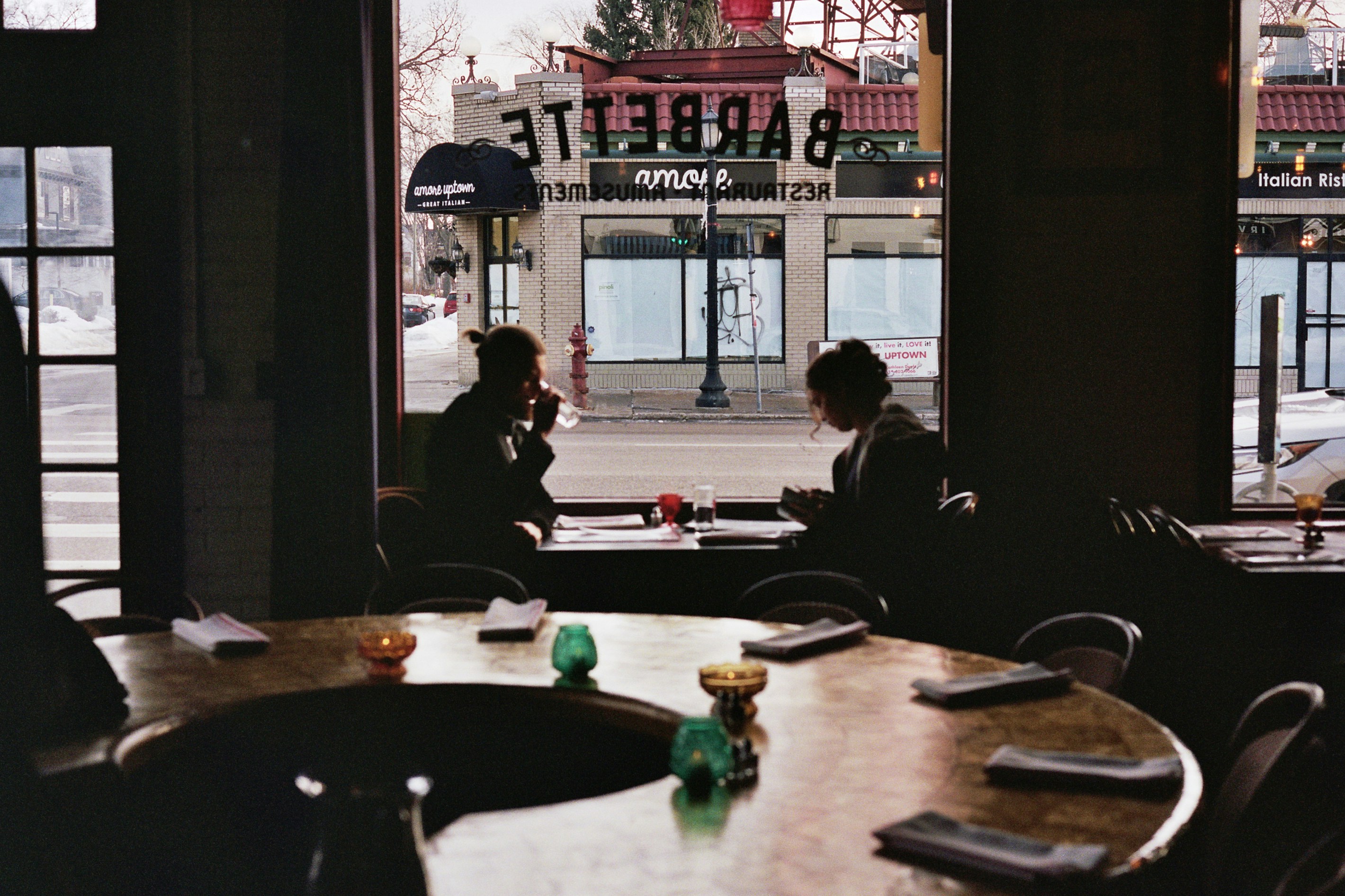 Lawyer negotiating across a table from an insurance adjuster - car accident attorneys in austin