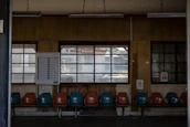 Comfortable waiting area near Bosan Road location with calming white and teal decor.