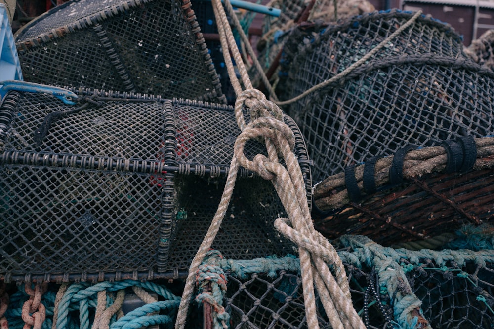 a pile of fishing nets with ropes attached to them