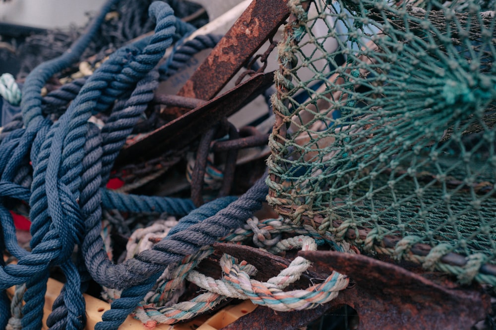 a pile of old fishing nets and ropes