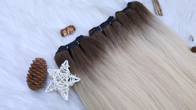 a white fur with some pine cones and a pair of scissors