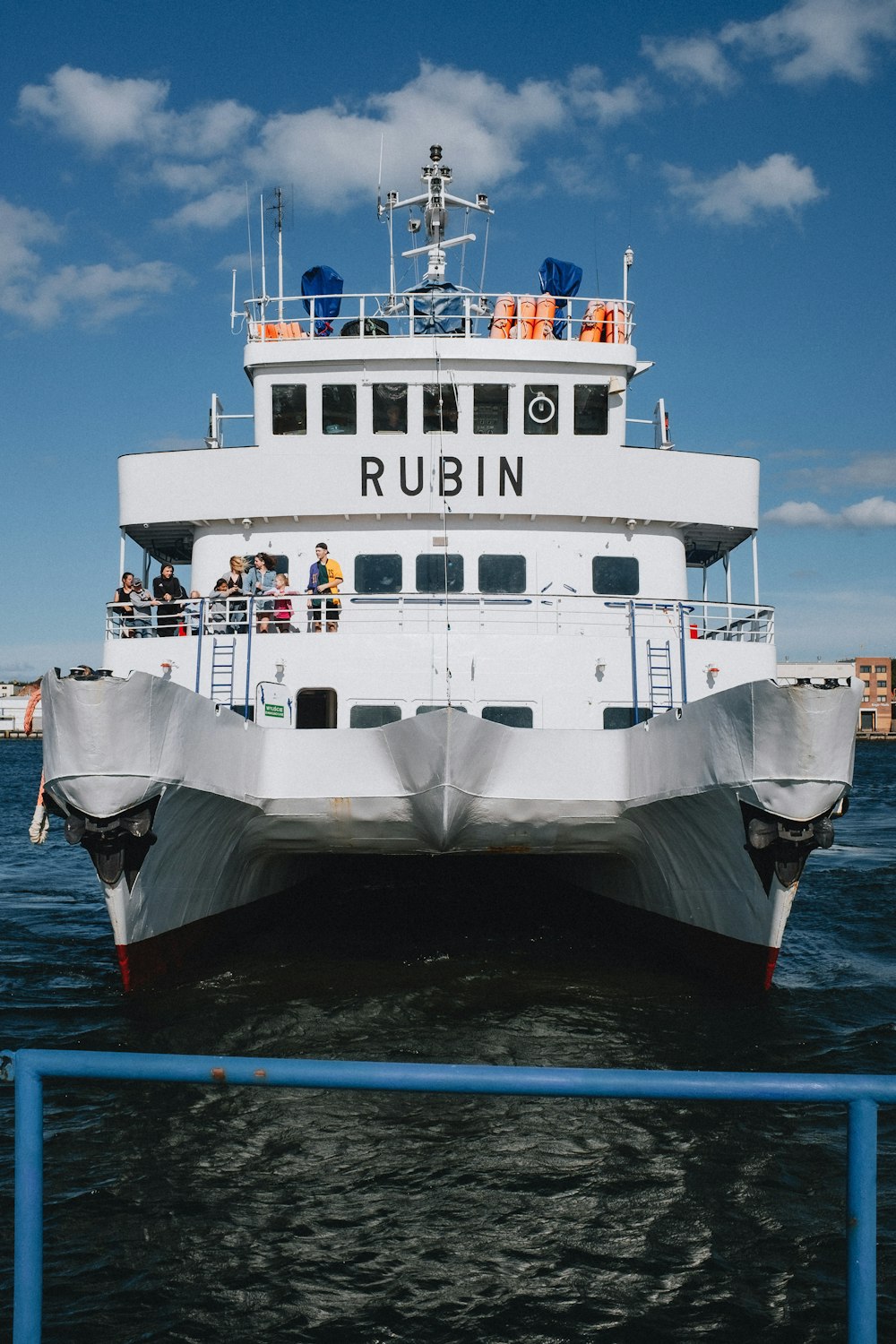 a large white boat floating on top of a body of water