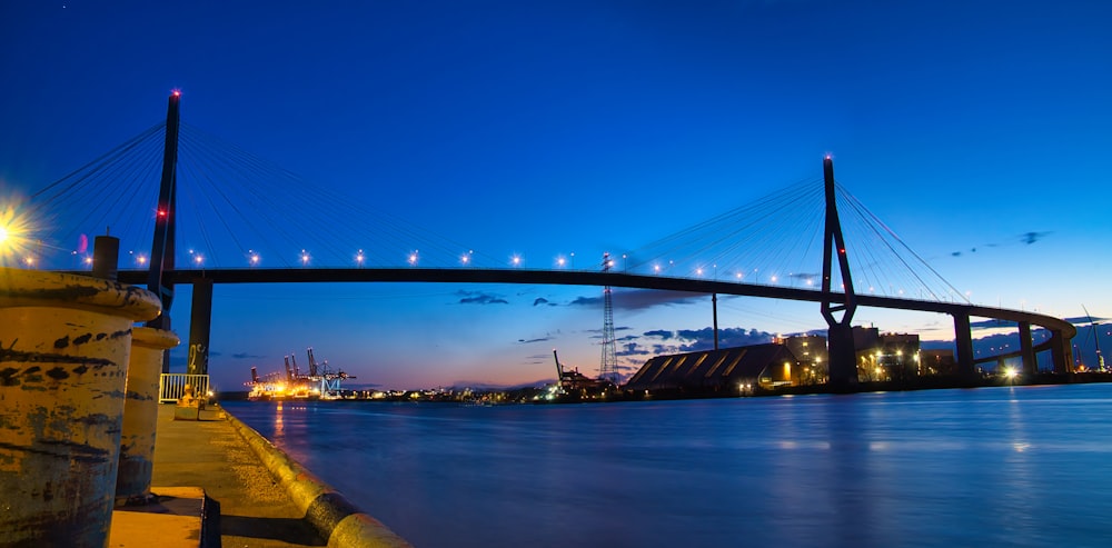 a large bridge spanning over a large body of water