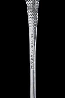 A close-up view of a silver metallic object with a textured surface. The object is inscribed with the text 'COPPERIST.WU S925'. The background is solid black, enhancing the focus on the metallic object.