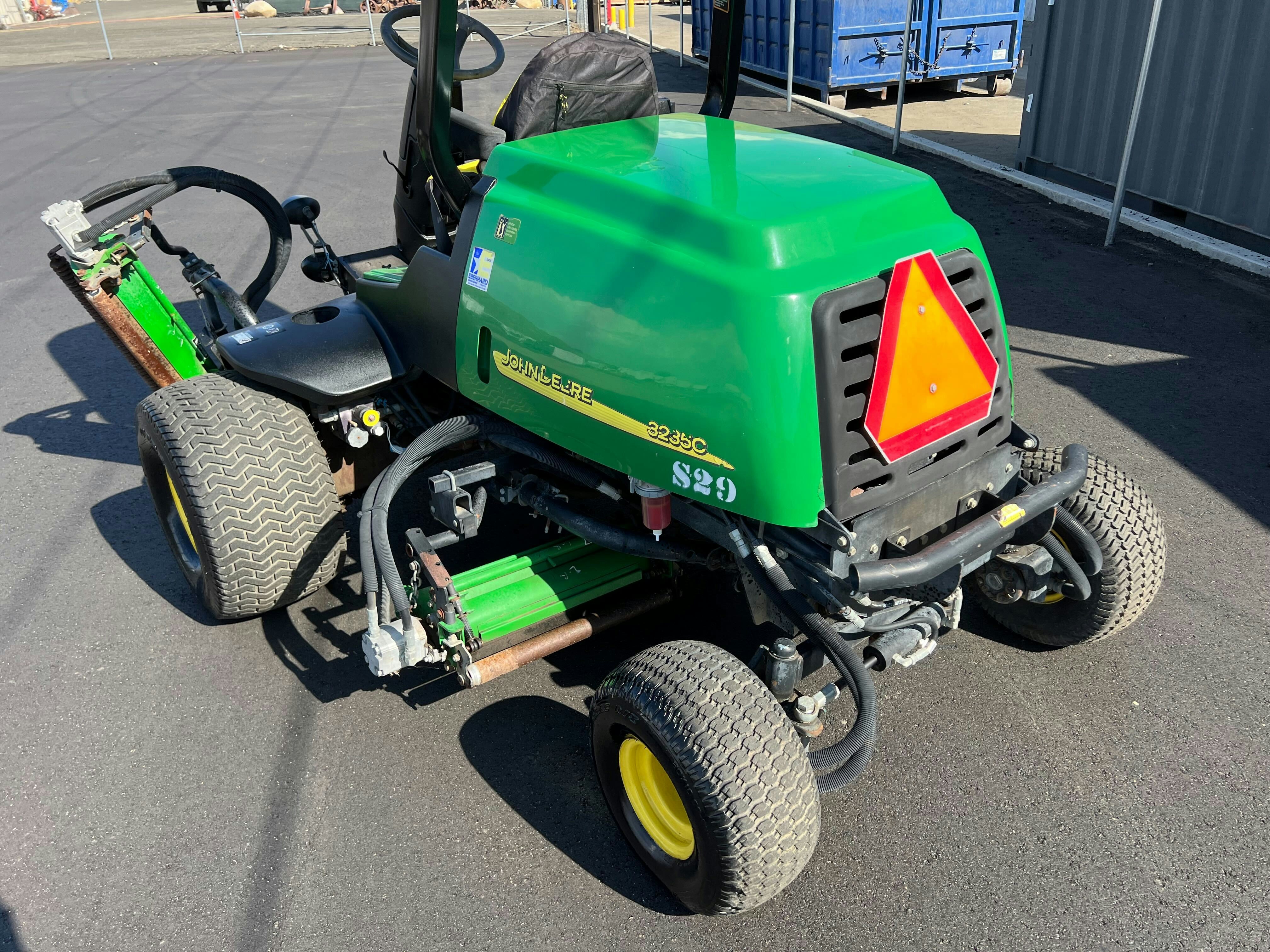 Zero-turn mower on a lush green Florida lawn