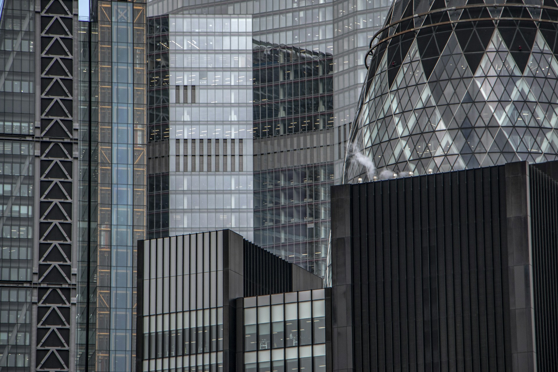 black and brown leather padded tub sofa
