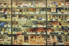a display case filled with lots of different types of food