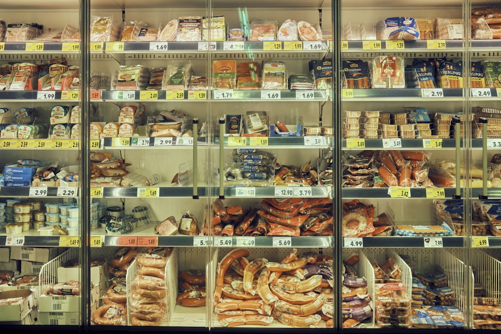 a display case filled with lots of different types of food