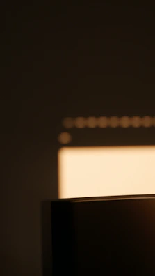 Minimalist UV printed piece showcasing delicate textures illuminated by cinematic lighting and soft shadows.