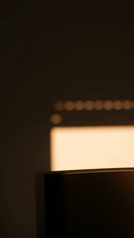 A minimalist sculpture bathed in soft natural light, emphasizing form and shadow.