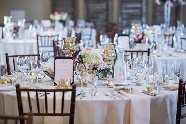 a table is set up for a formal dinner