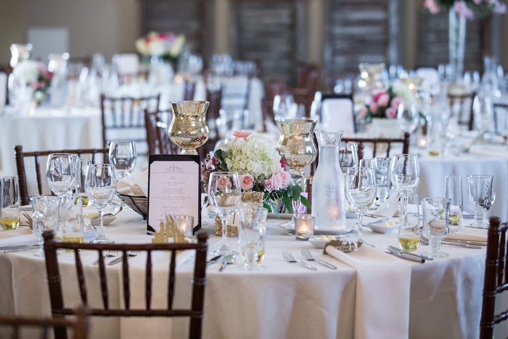 a table is set up for a formal dinner