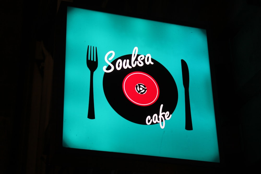 a restaurant sign with a fork and knife on it