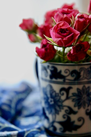 A beautifully sublimated mug showcasing a detailed floral design with vivid hues