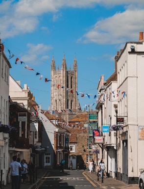 a city street with a church in the background