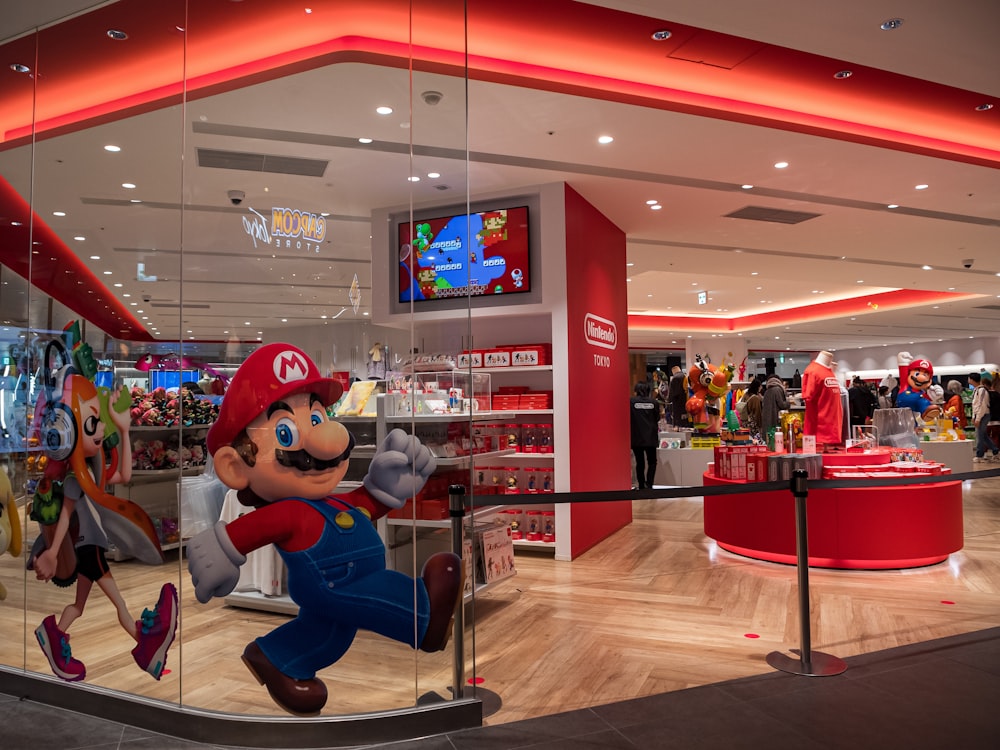 a nintendo store with mario running through the store