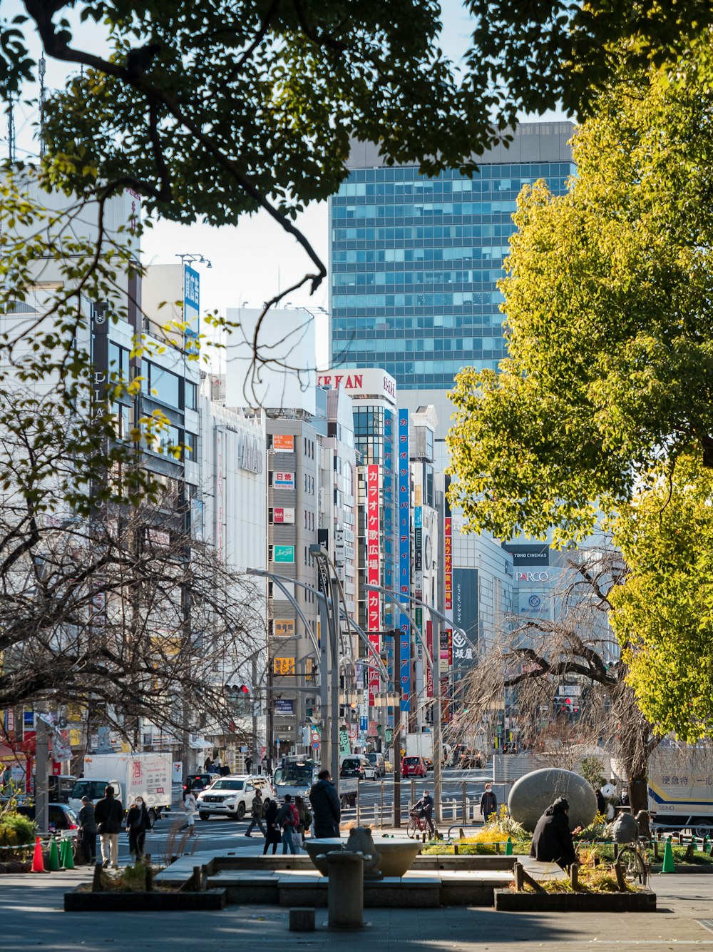 a city street filled with lots of tall buildings