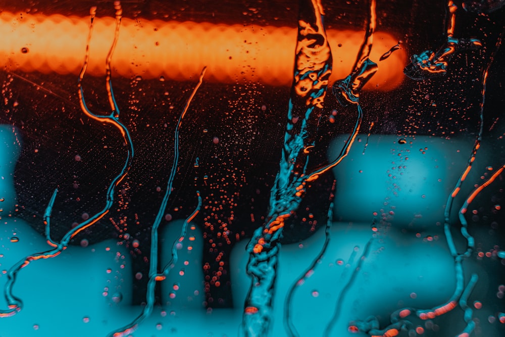 a close up of a window with water on it