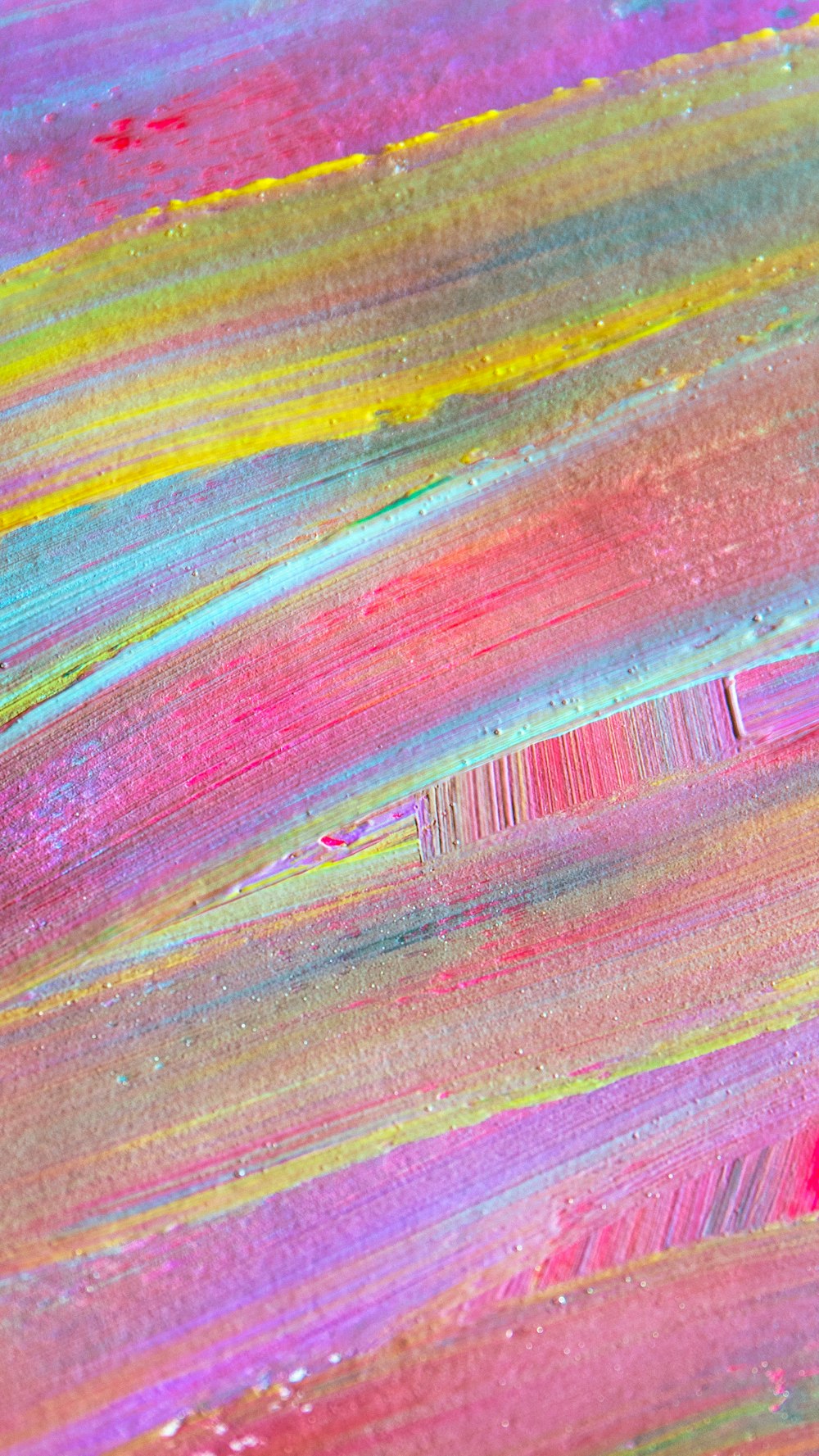 a close up of a colorful paint background
