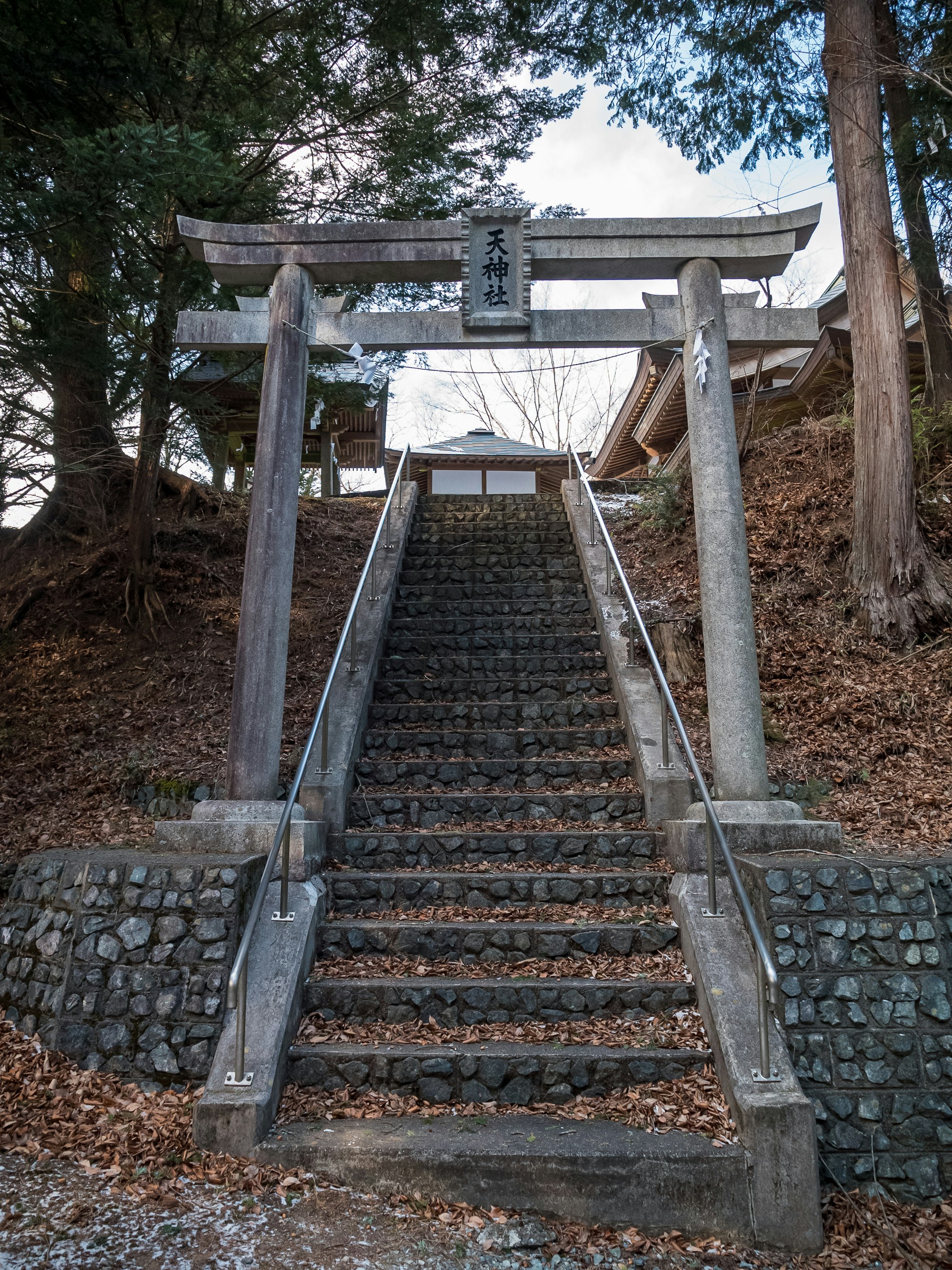 a set of stairs leading up to a shrine