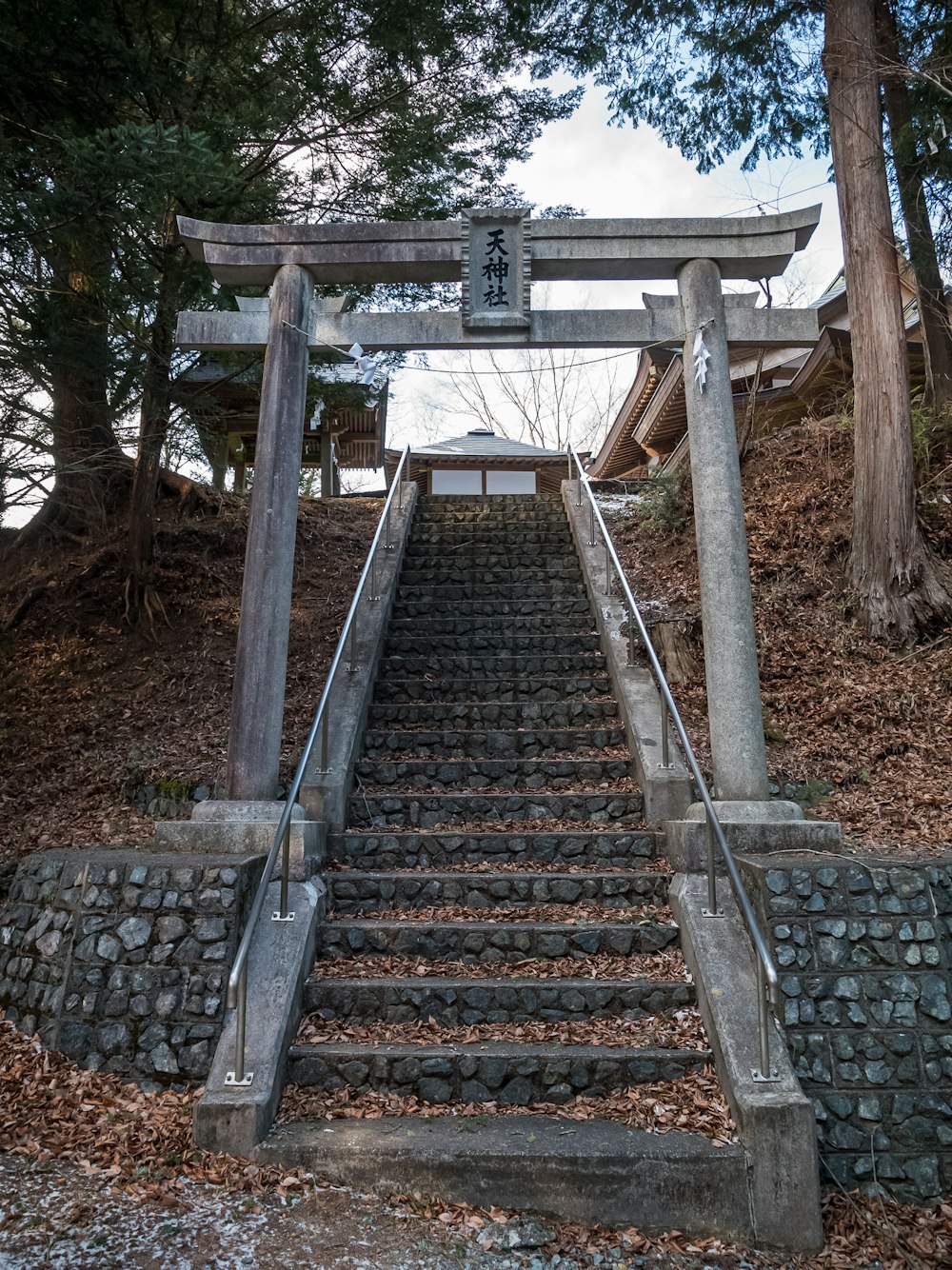 a set of stairs leading up to a shrine