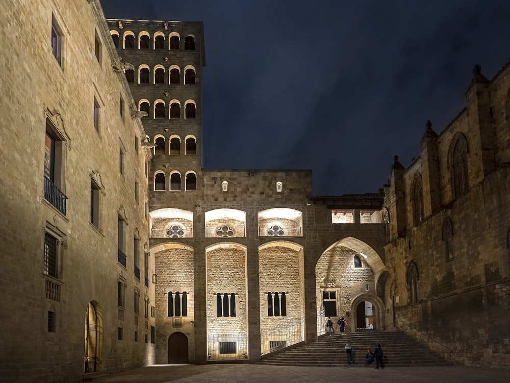 a stone building with a staircase leading up to it