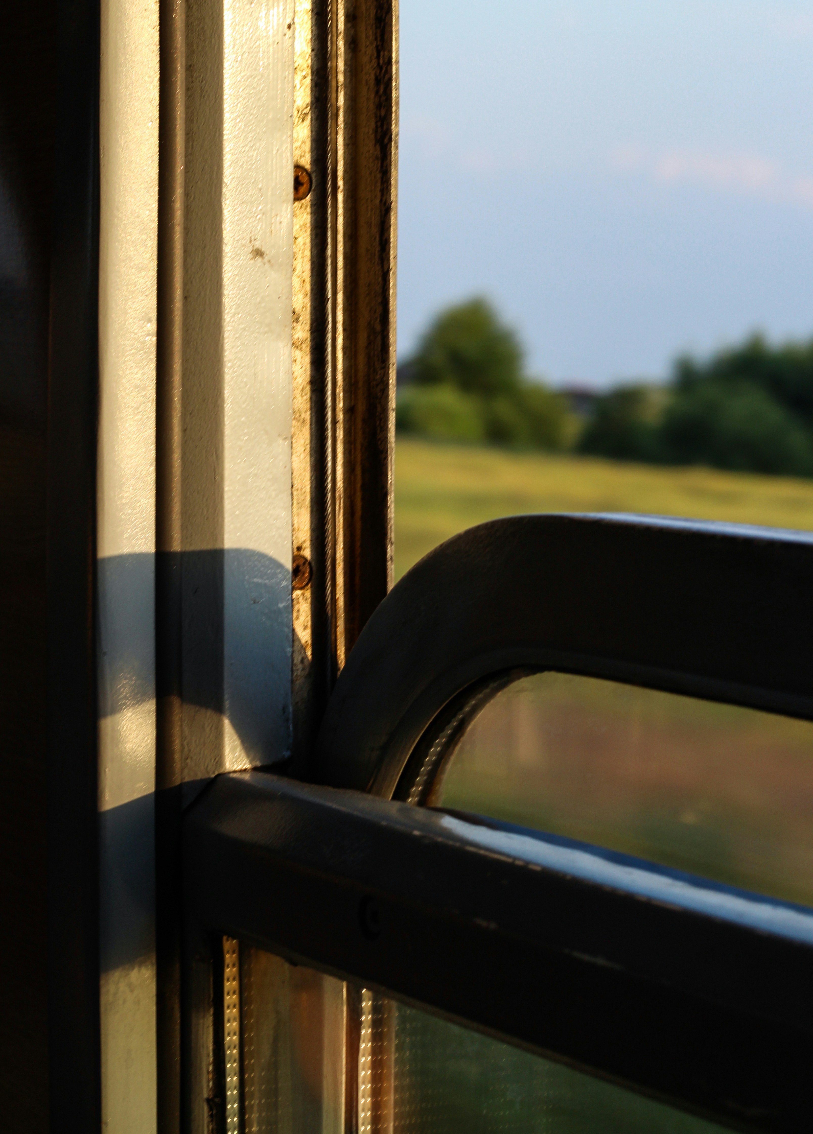 View from a train window at sunset