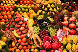 a large display of various fruits and vegetables