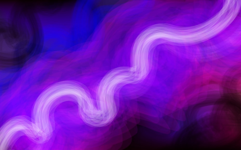 a blurry image of a purple wave