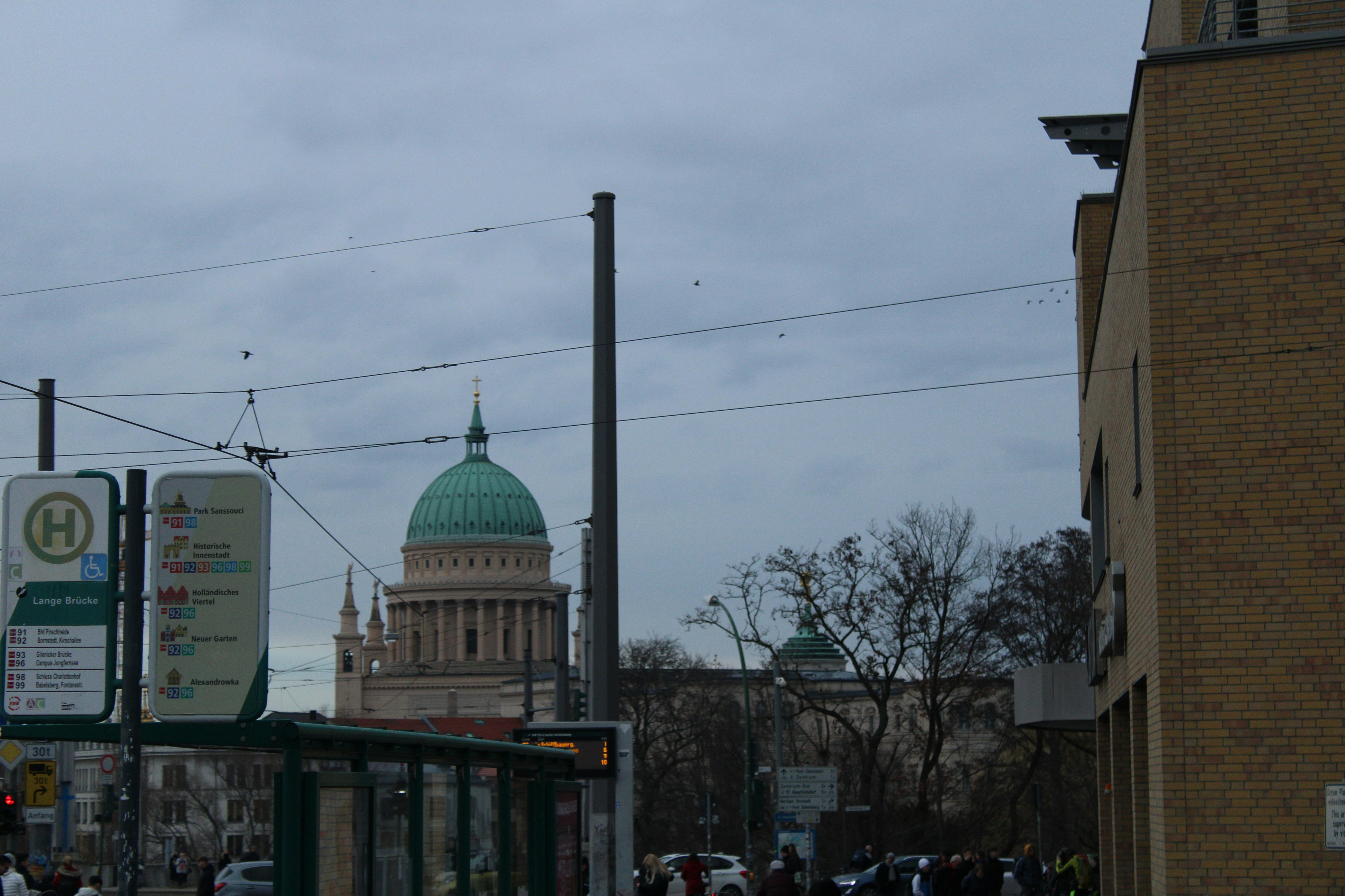 a building with a green dome on top of it